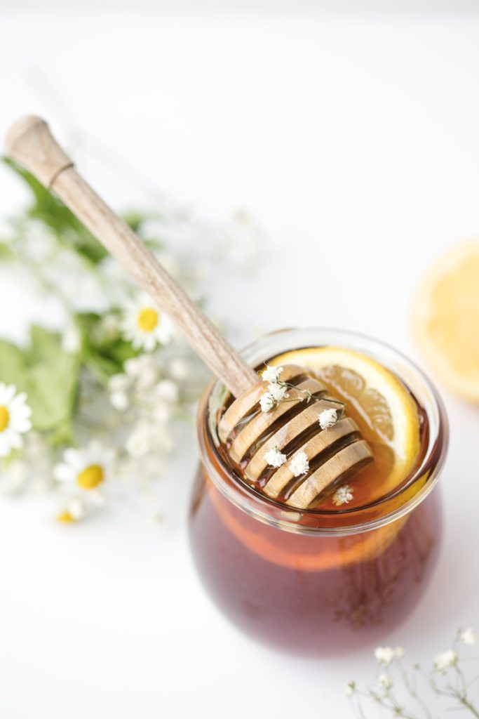 jar of honey and flowers