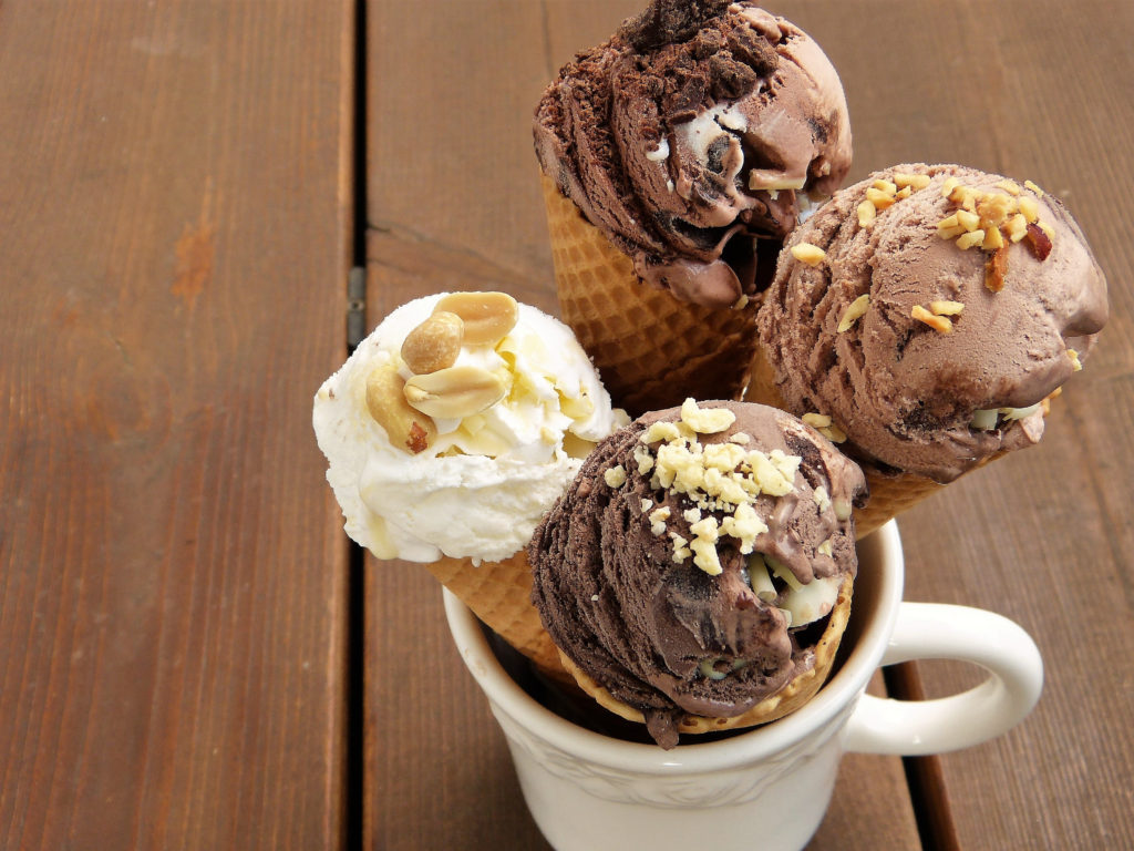 mug of ice cream cones against wood backdrop