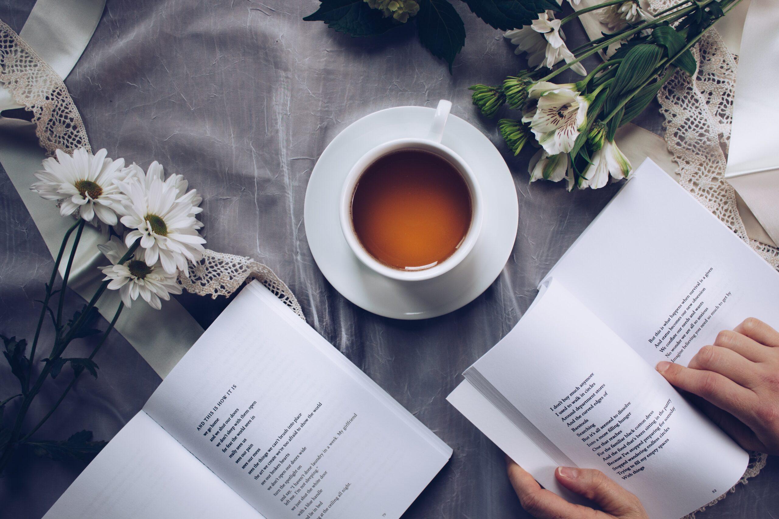 Cup of tea and books, mental health tips for small business owners
